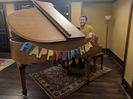 Iola's fifth birthday present, a piano!
